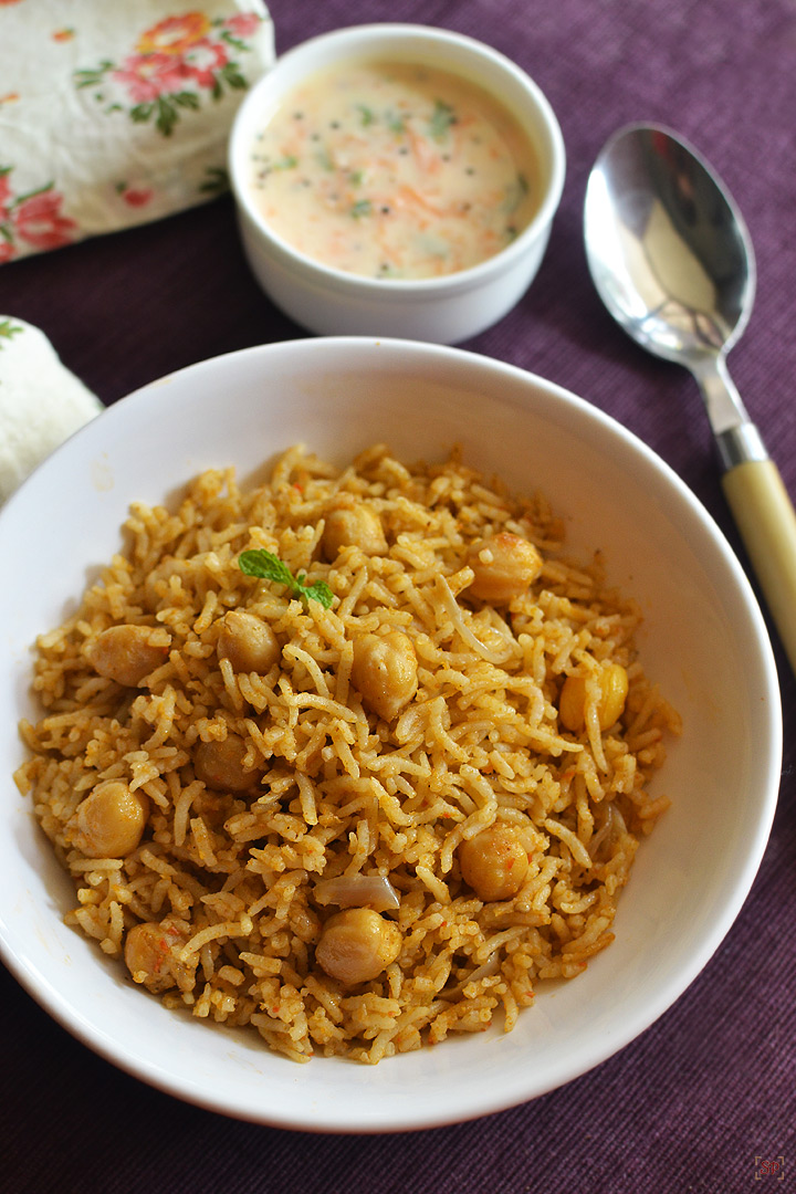 chana biryani in a white bowl