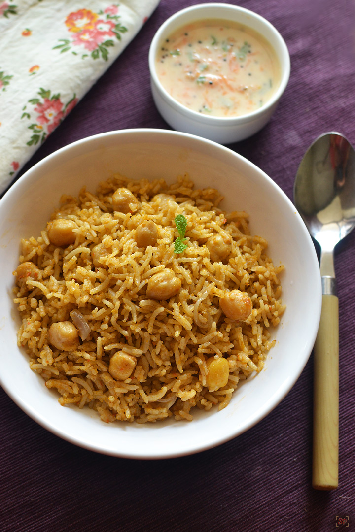 chana biryani in a white bowl