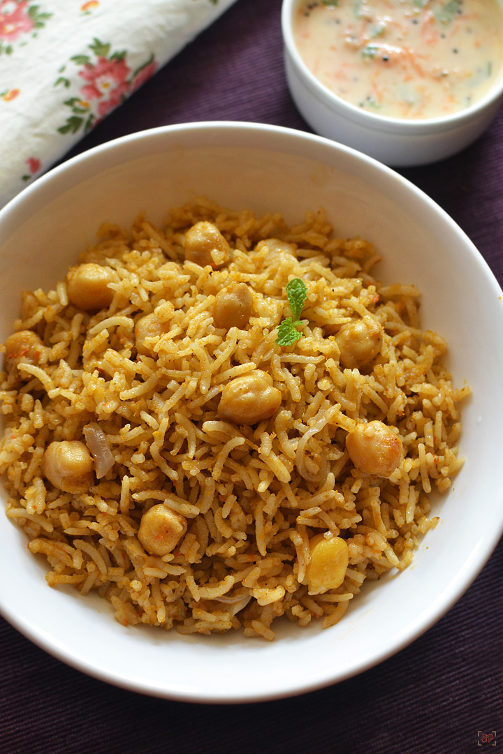 chana biryani in a white bowl