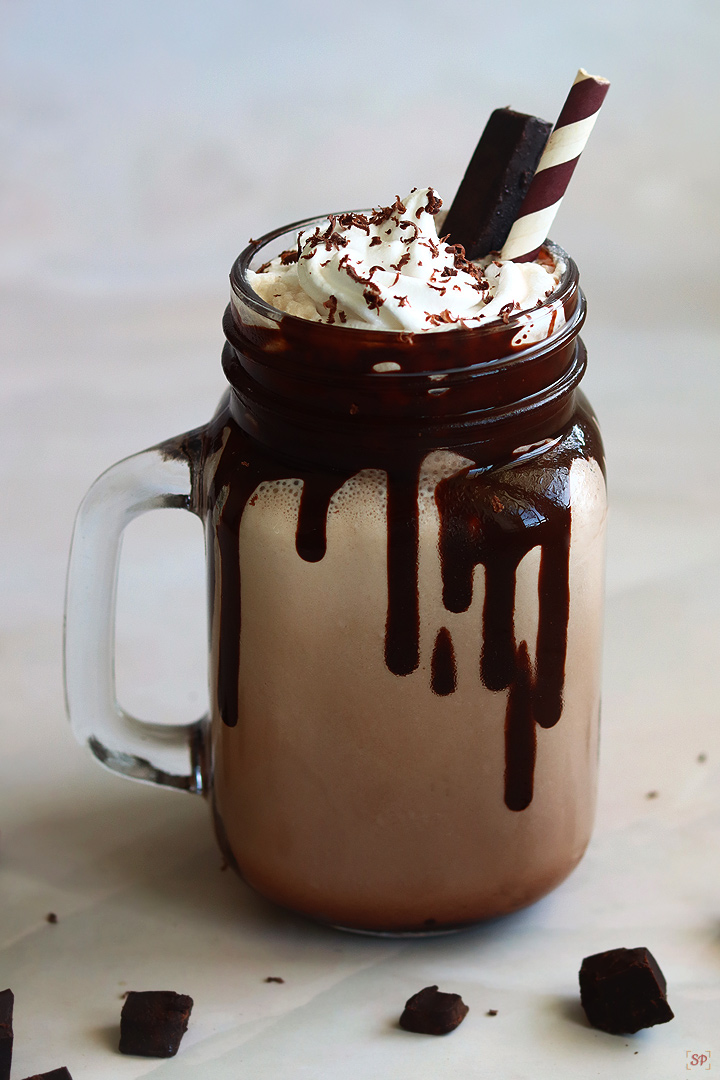 chocolate milkshake served with whipped and garnished with grated chocolate