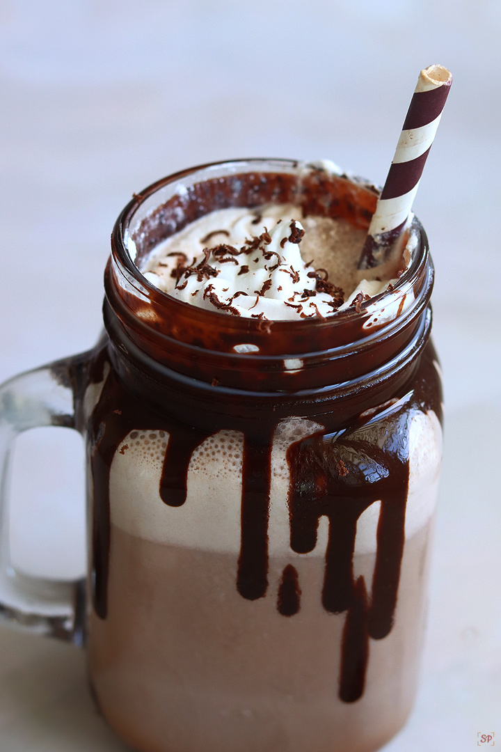 chocolate milkshake served with whipped and garnished with grated chocolate