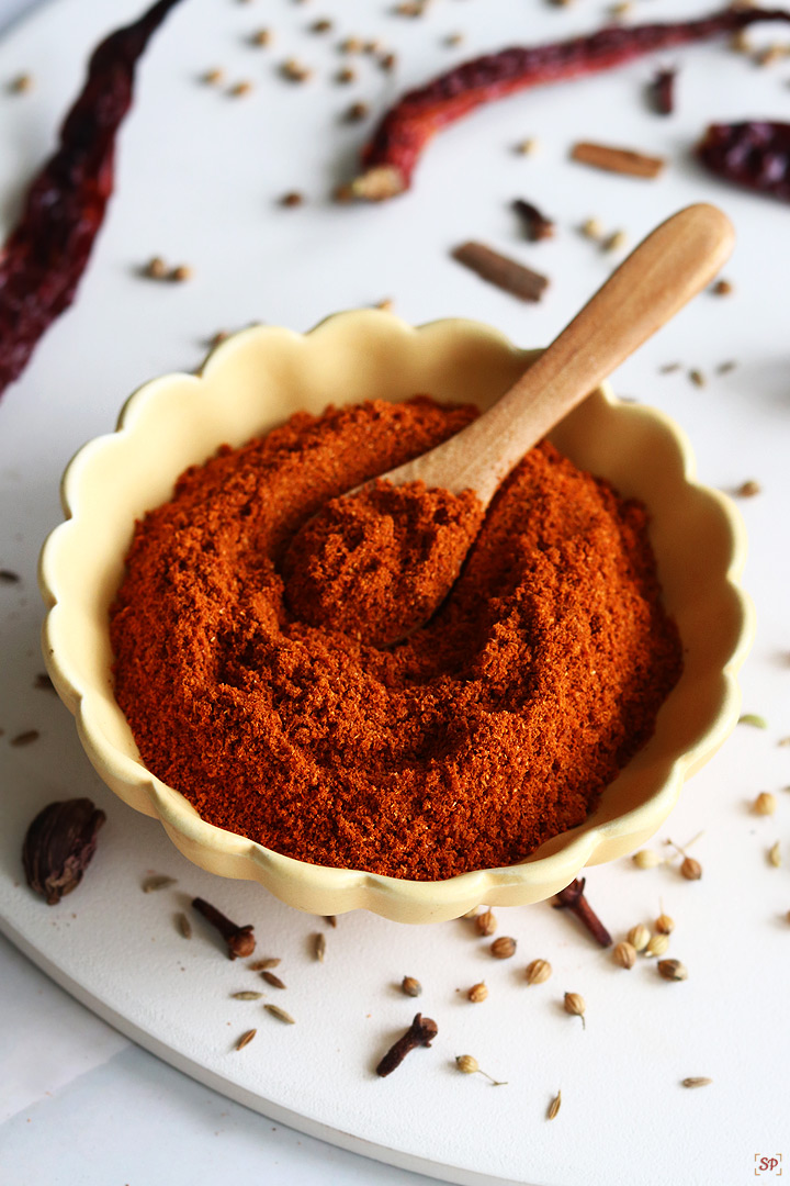 pav bhaji masala powder in a yellow bowl