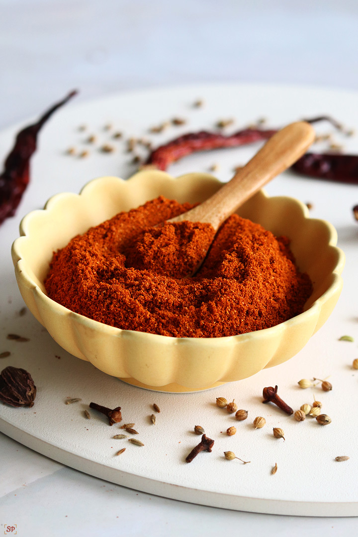 pav bhaji masala powder in a yellow bowl