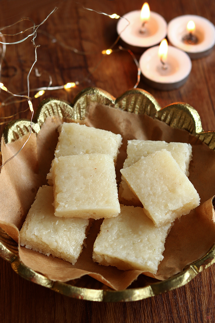 coconut barfi served in a gold plate