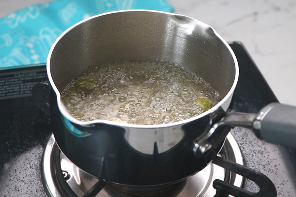 boil with ginger and cardamom