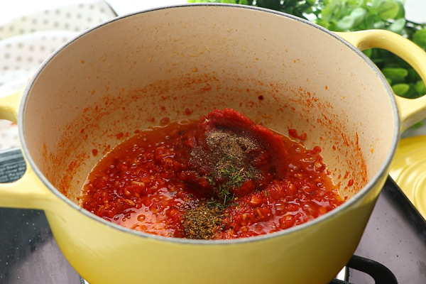 add tomato pasta along with herbs