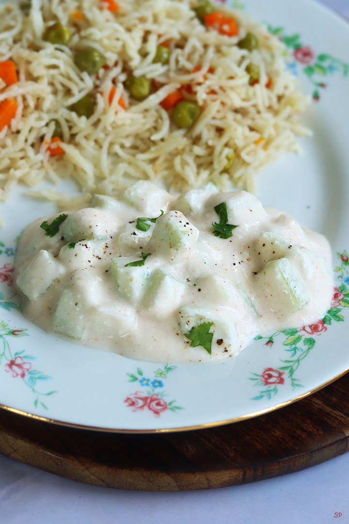 cucumber raita served with vegetable pulao