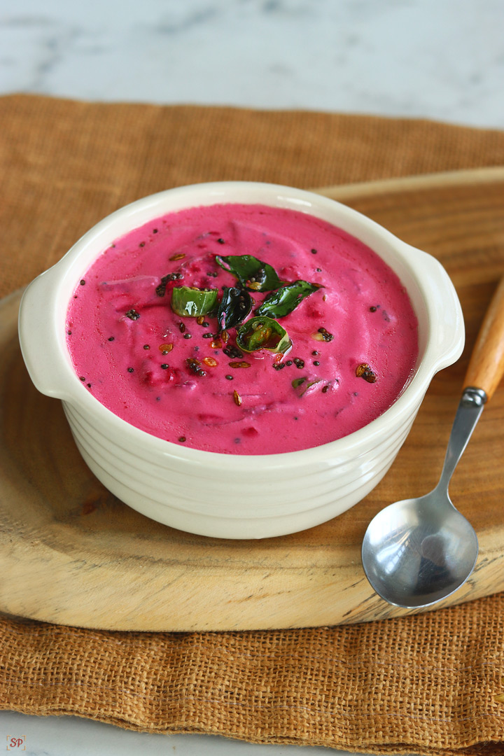 beetroot raita in a beige color bowl