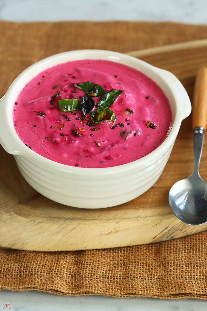 beetroot raita in a beige color bowl