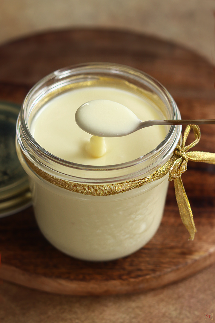 homemade condensed milk in a glass jar