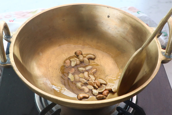 fry cashews until golden brown