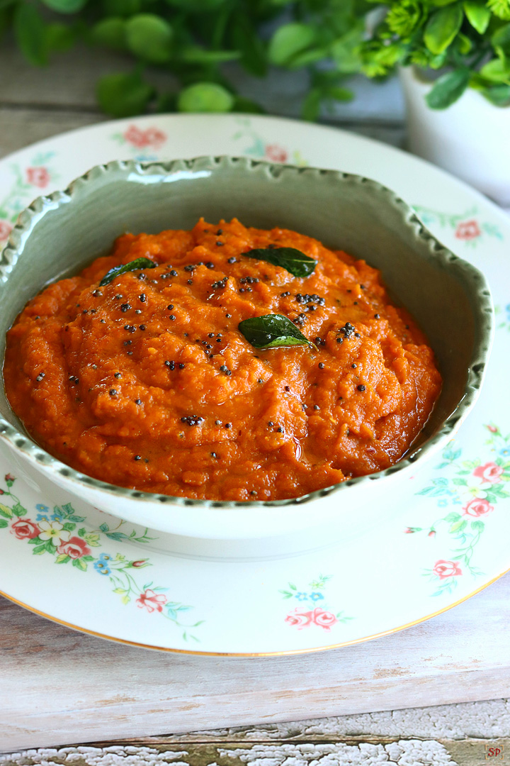 carrot chutney in a green bowl