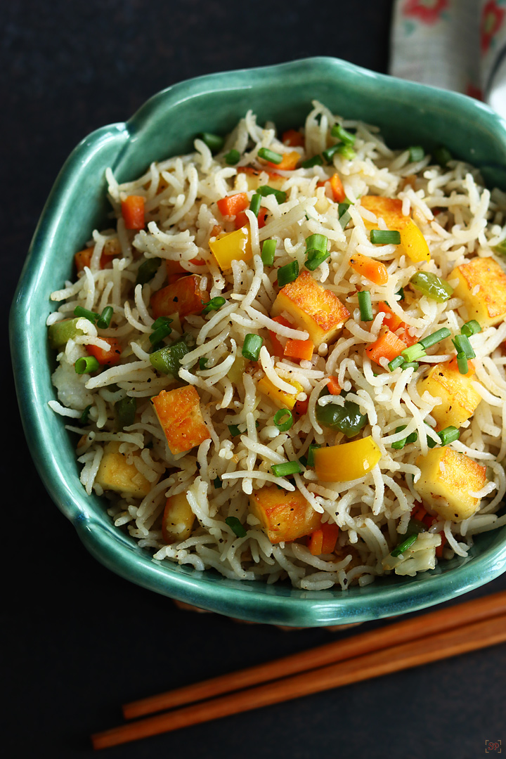 paneer fried rice in a teal color bowl