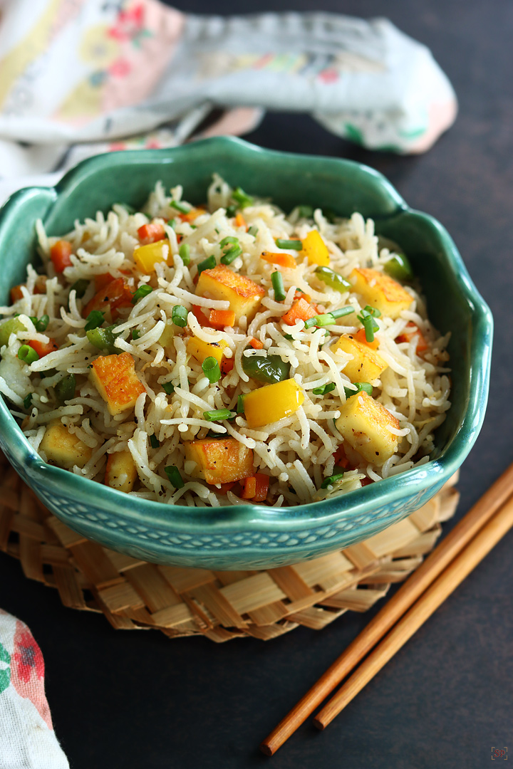 paneer fried rice in a teal color bowl