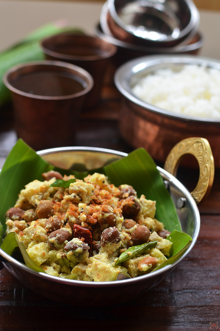 kootu curry served in banana leaf with rice