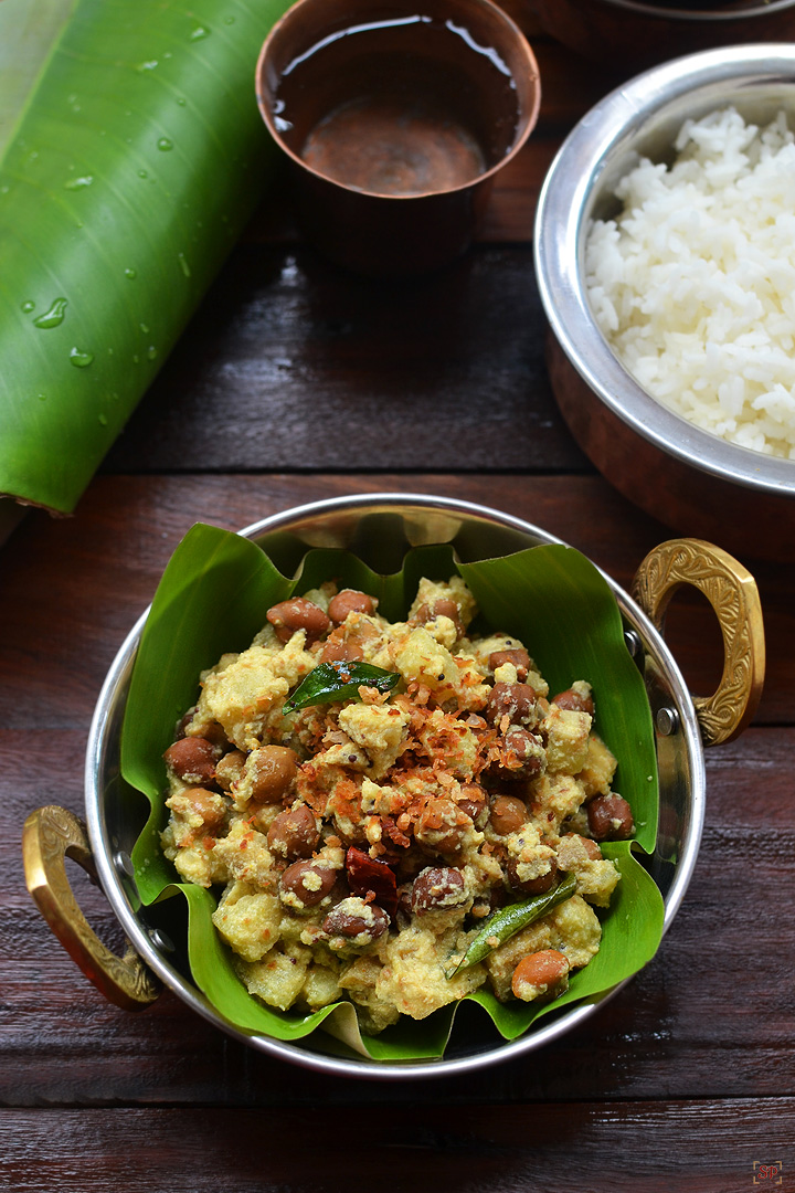 kootu curry served in banana leaf with rice