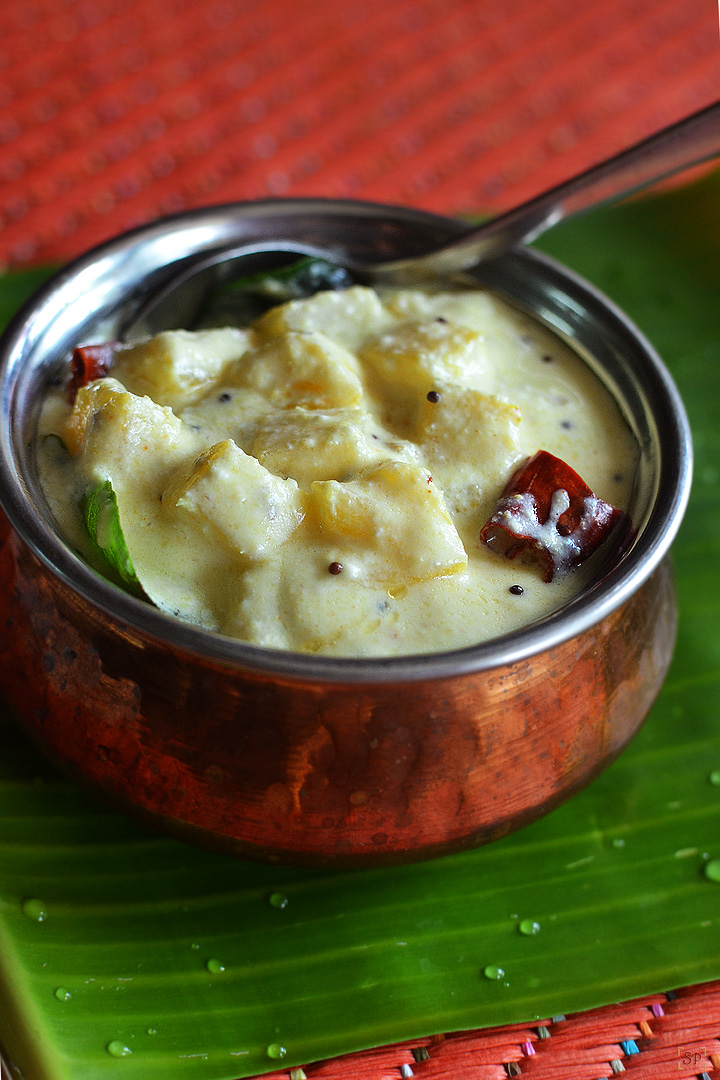 pineapple pachadi served in a copper base bowl