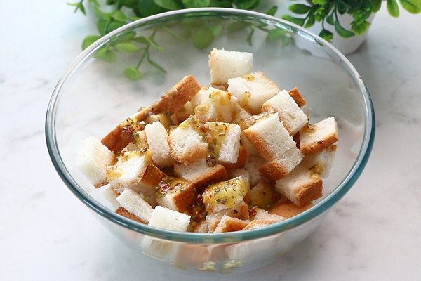 add the prepared seasoning to bread