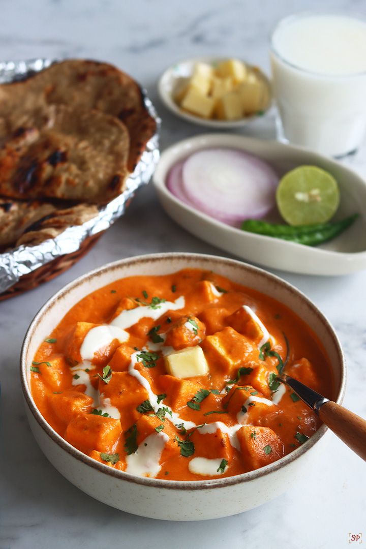 paneer butter masala in a beige color bowl