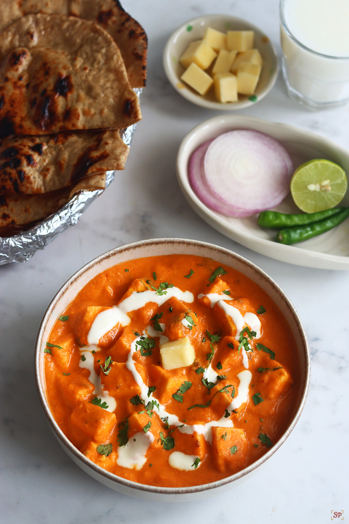 paneer butter masala in a beige color bowl