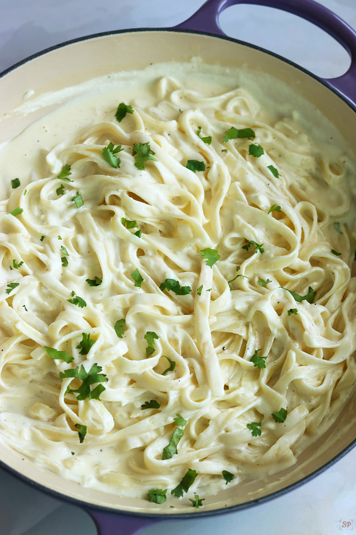 alfredo pasta cooked in a shallow casserole