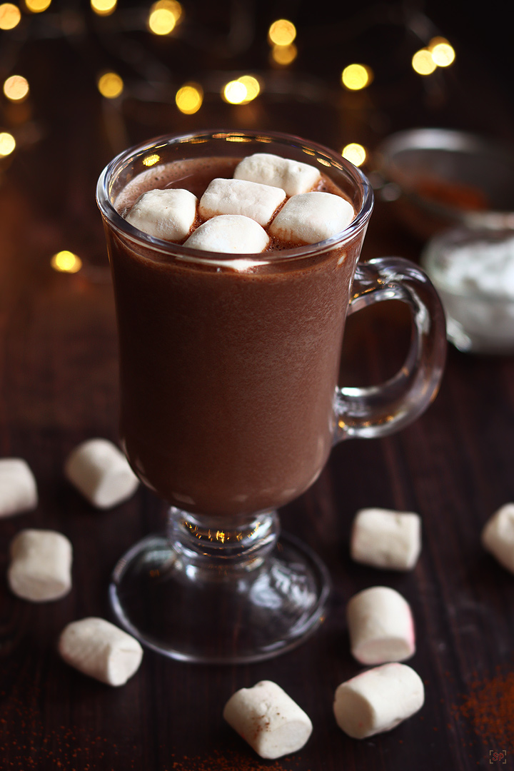 hot cocoa served in a glass mug