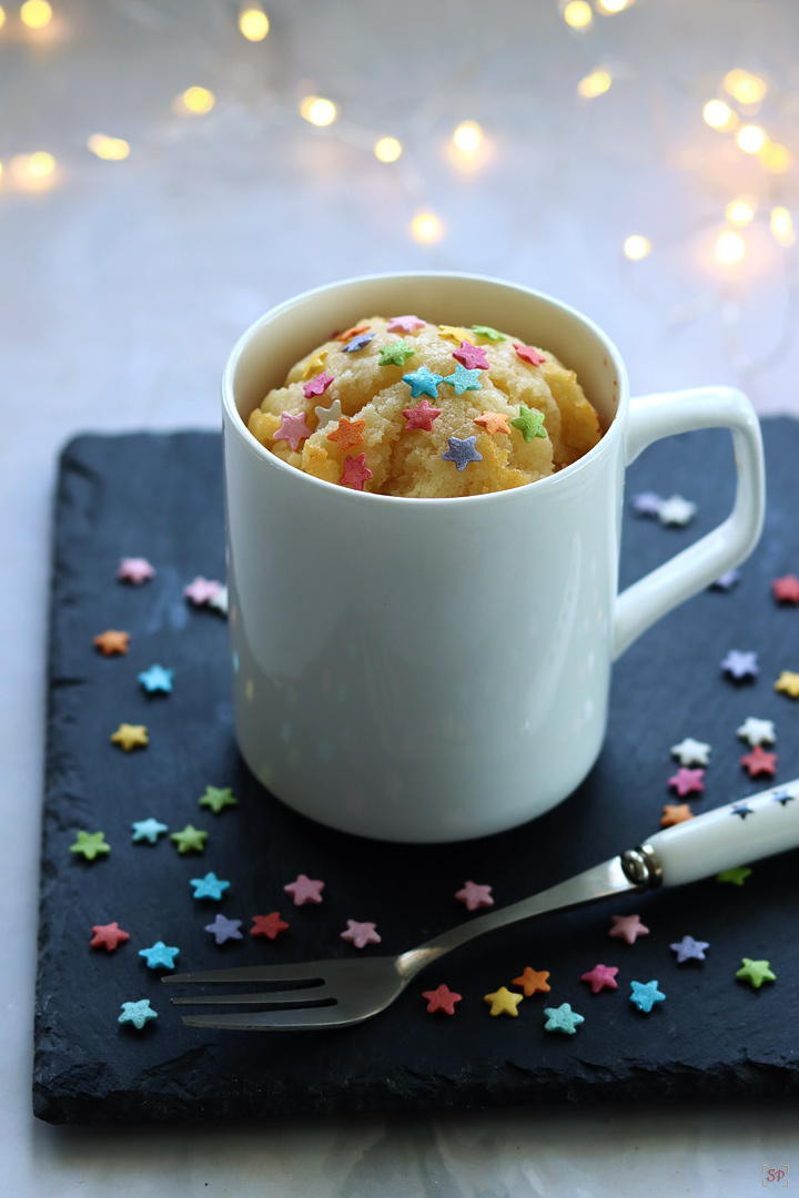 vanilla mug cake in a white mug