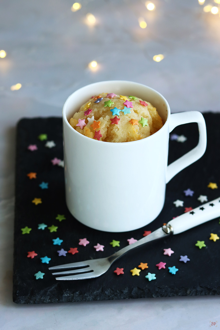 vanilla mug cake in a white mug