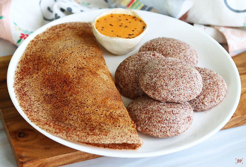 ragi idli and dosa served in a plate with chutney