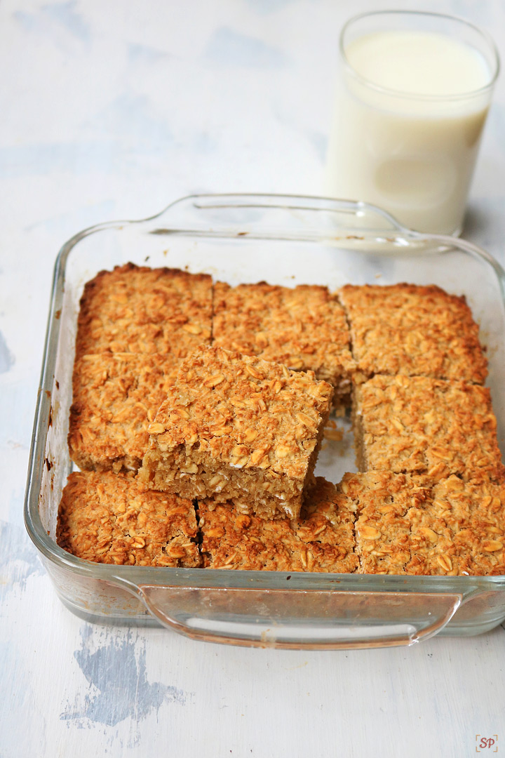 oatmeal bars with a cup of milk