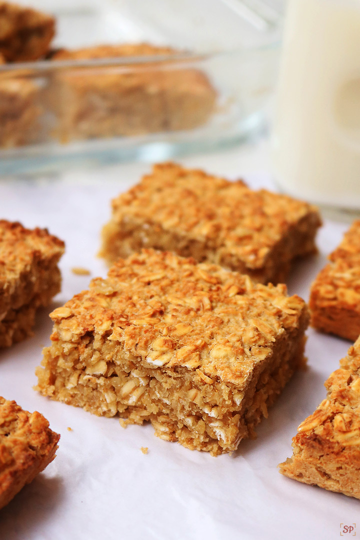 oatmeal bars with a cup of milk