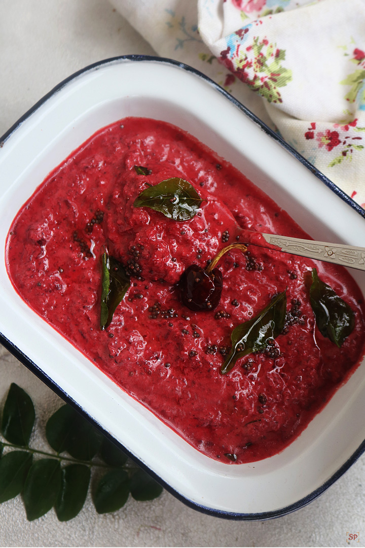 beetroot pachadi  served in white bowl