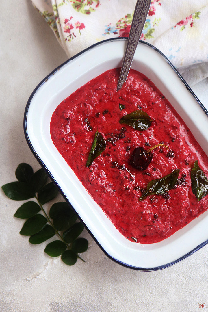 beetroot pachadi  served in white bowl