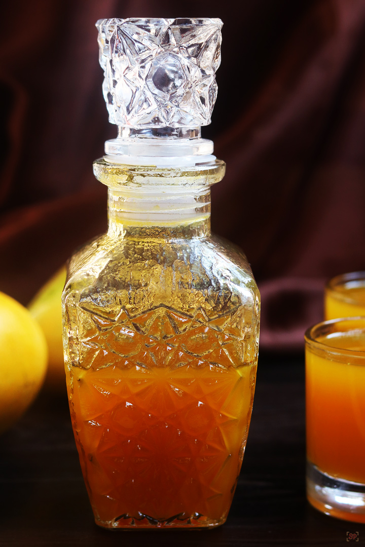 mango squash stored in a glass bottle