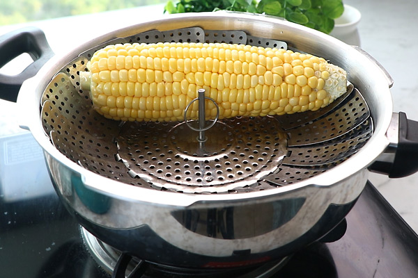 corn placed in steamer