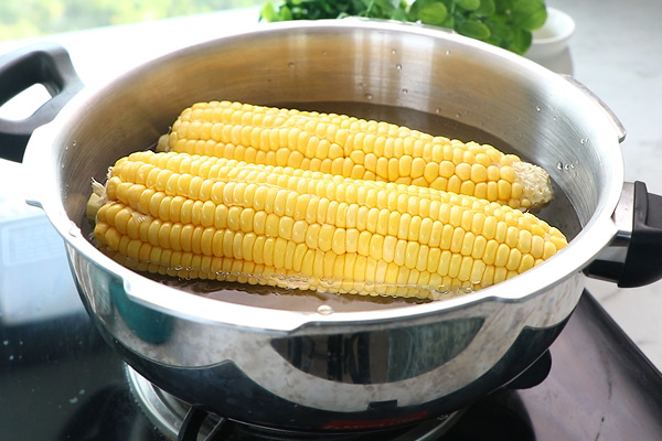 add corn to pressure cooker