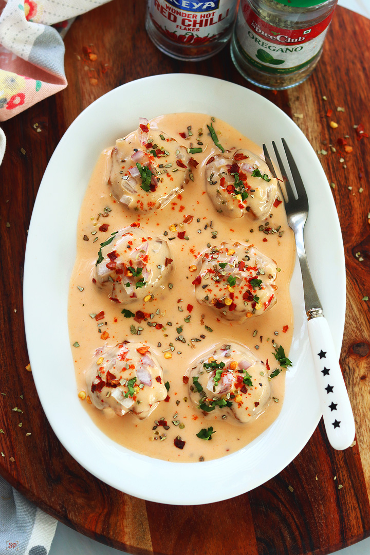 cajun potatoes in a white plate