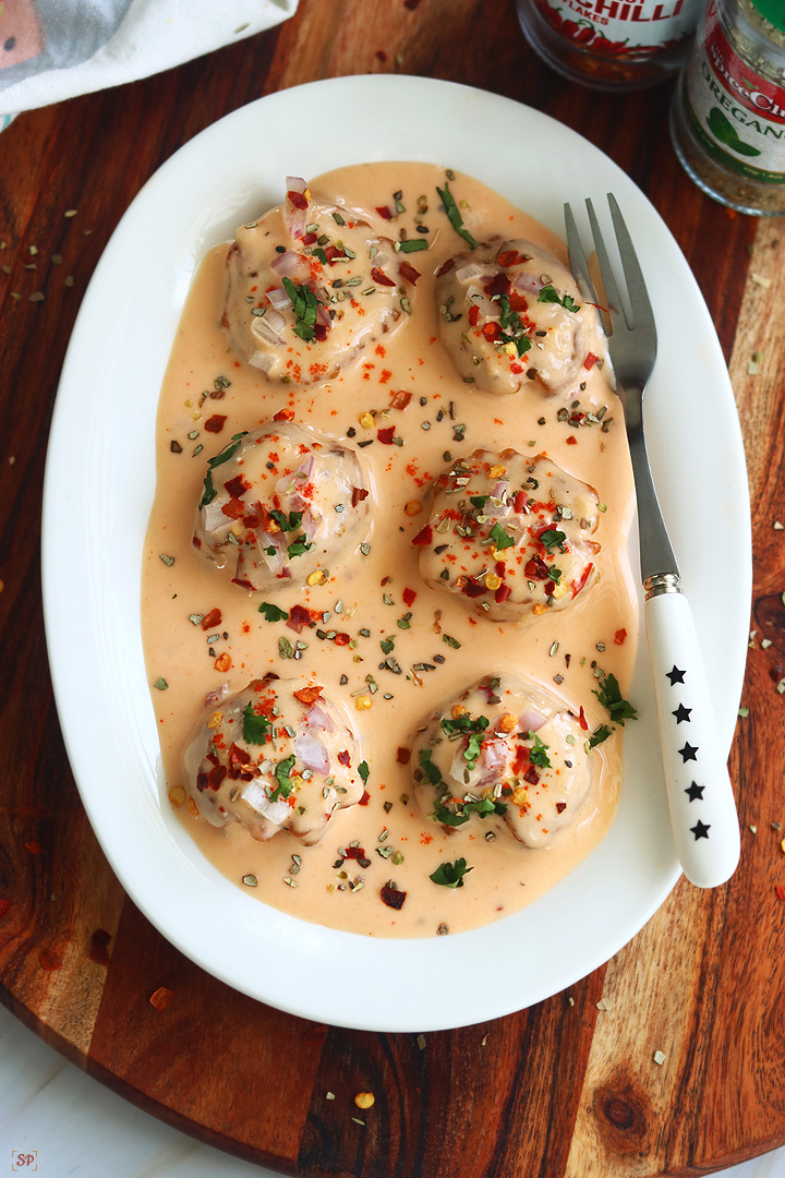 cajun potatoes in a white plate