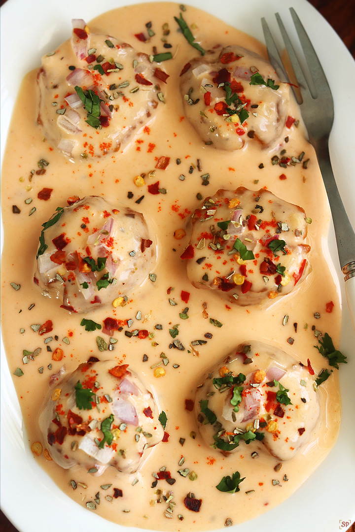 cajun potatoes in a white plate