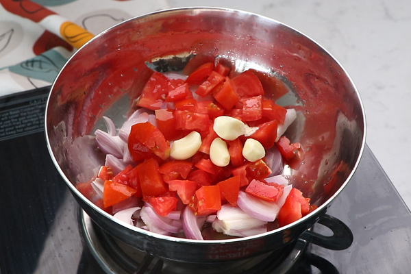 add onion, tomato, garlic