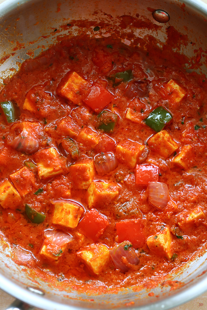 kadai paneer in a kadai