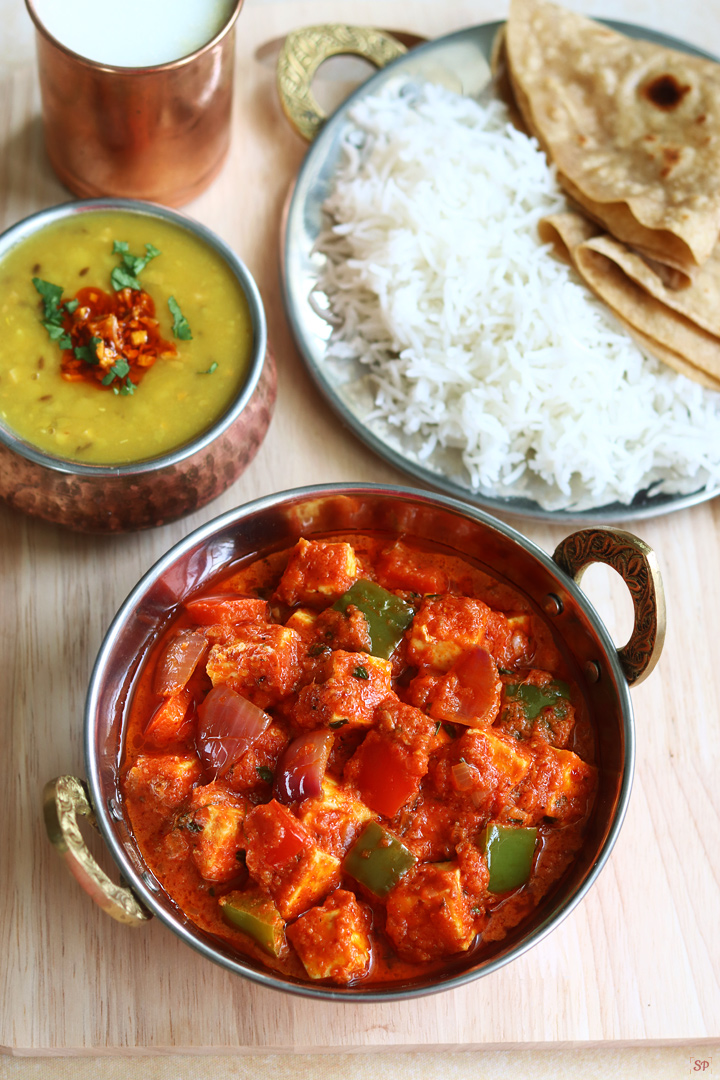 kadai paneer served with rice, roti