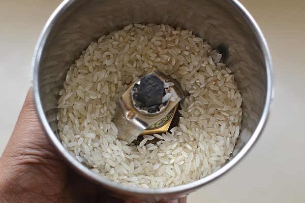 take raw rice in a mixer