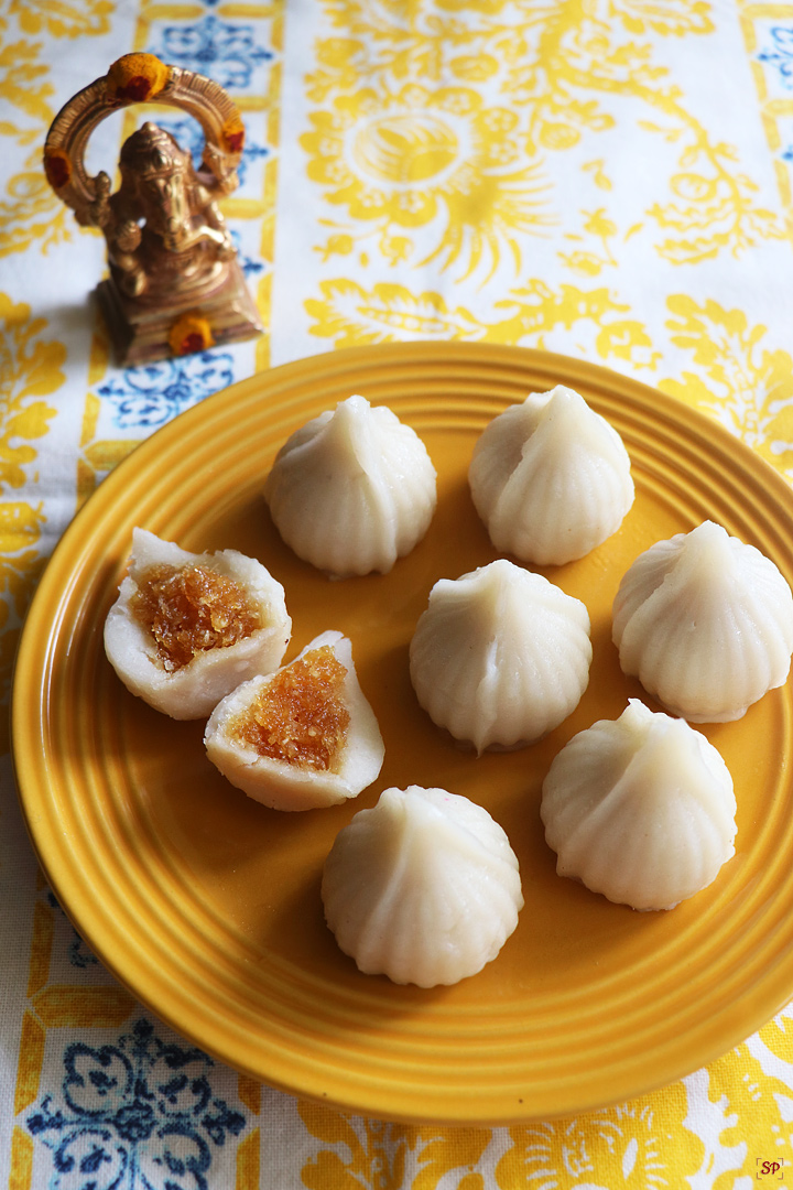 modak served in a yellow plate