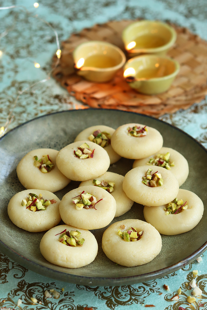 milk peda in a green color plate