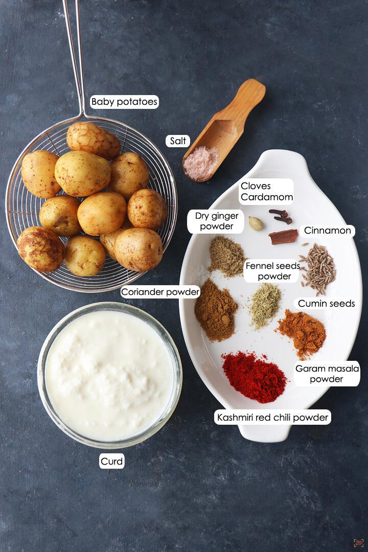 a display of ingredients needed to make kashmiri dum aloo