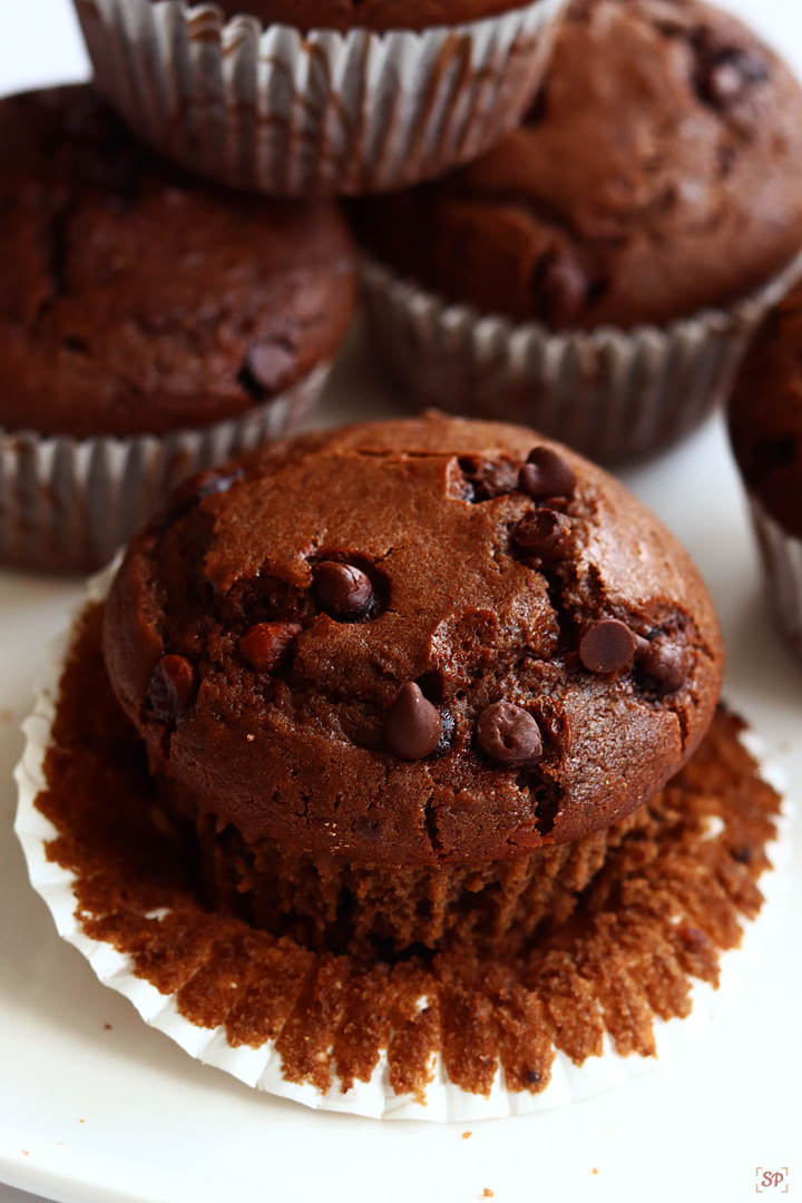 chocolate muffins arranged in a white plate