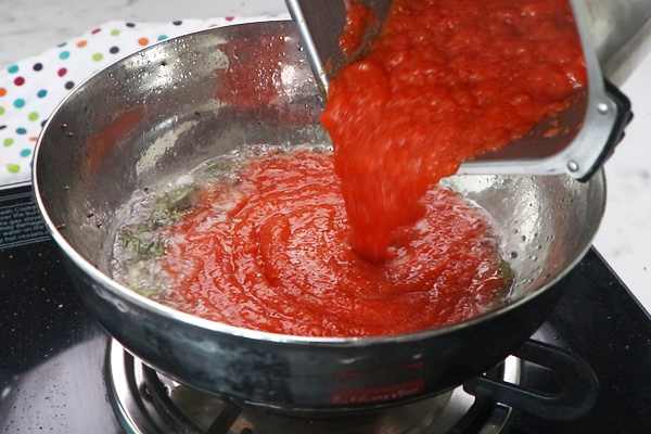 add onion tomato puree