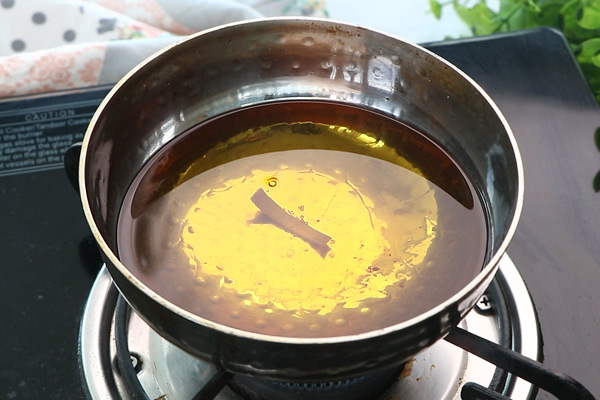 heat oil, check with one onion string