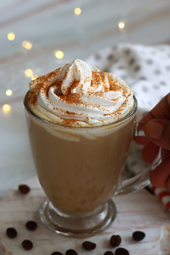 pumpkin latte served with whipping cream